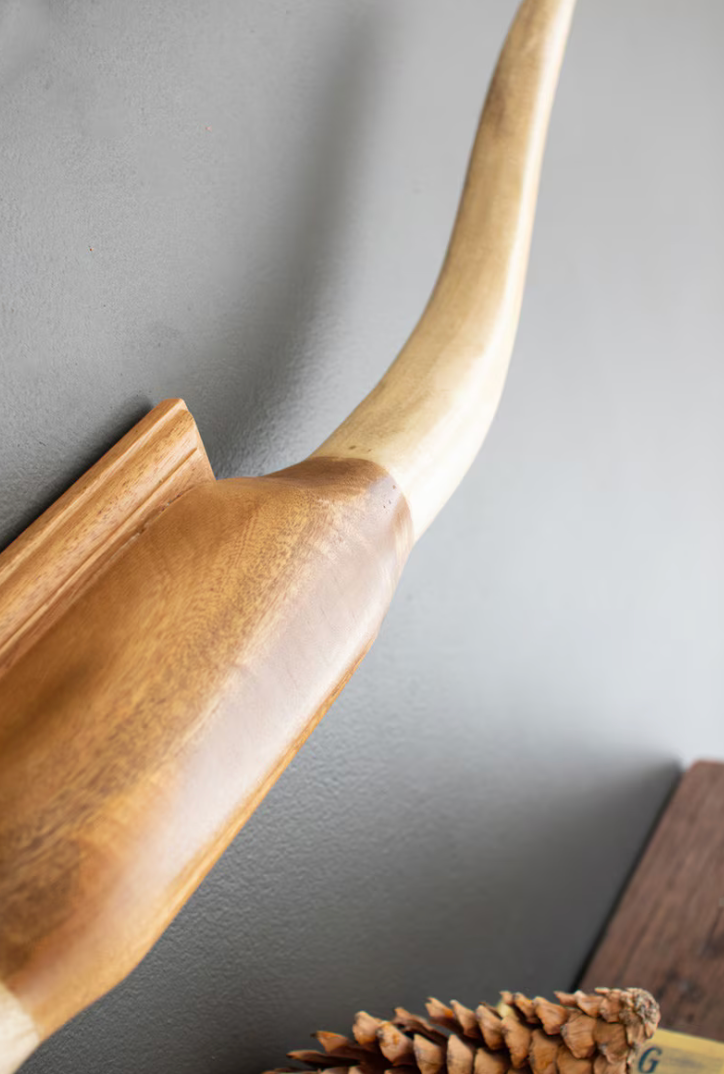 Wooden spoon on a gray background