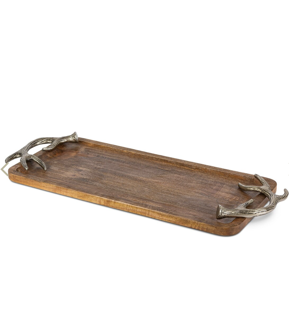 Wooden tray with metal antler handles on a white background