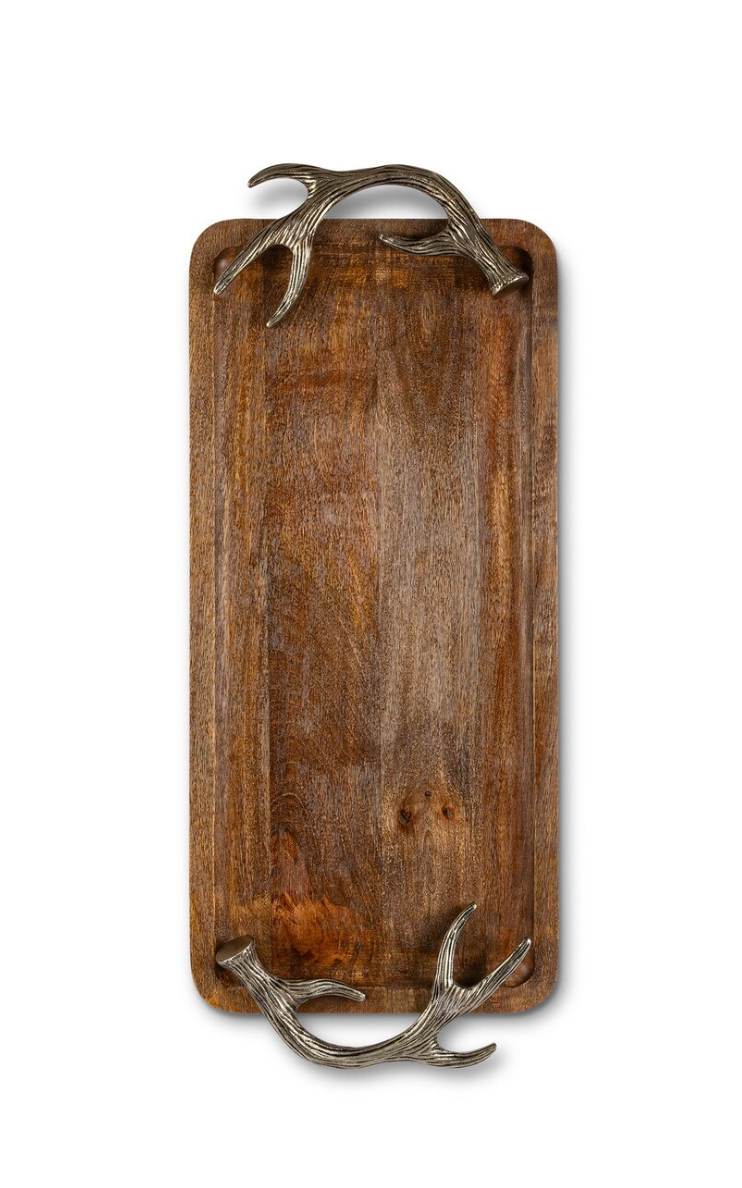 Wooden cutting board with antler handles on a white background