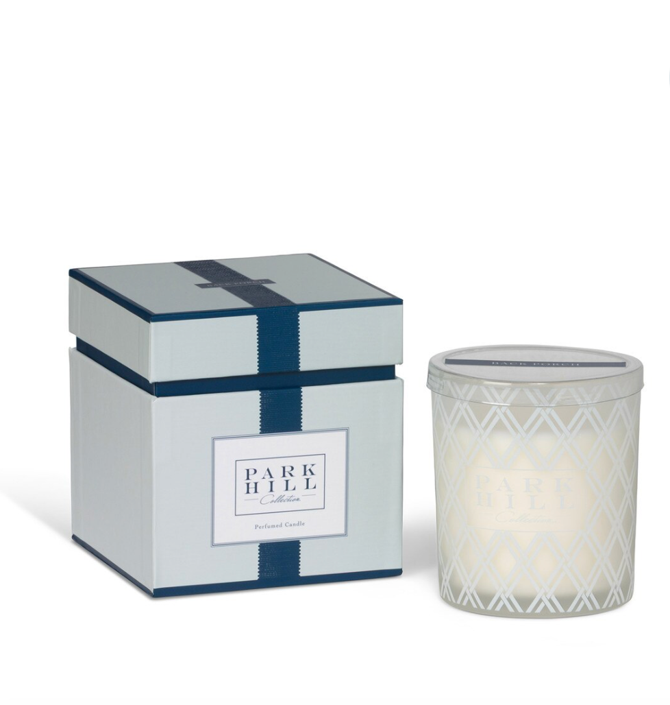 Candle with decorative box featuring 'Park Hill' branding on a white background