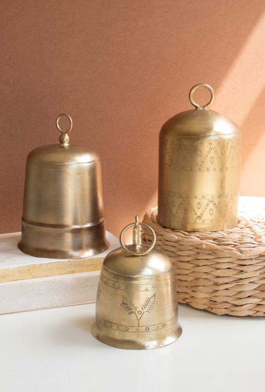 "Set of 3 Antique Brass Finish Bells by Kalalou displayed together showing three graduated etched metal bells with antique brass finish, handcrafted in India"