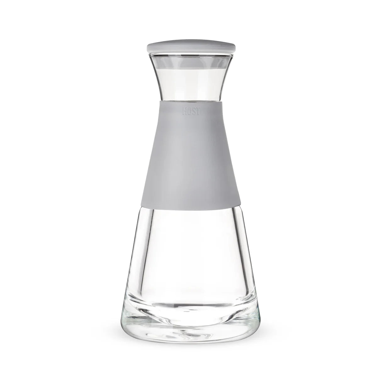 A clear glass carafe with a matte gray silicone neck band and a matching gray lid, shown on a plain white background.