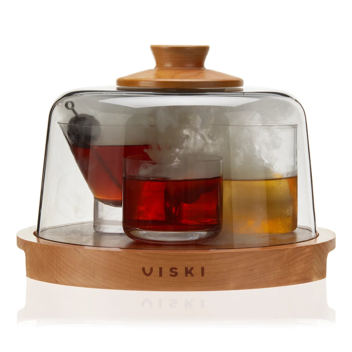 cocktail smoker wit 3 cocktail glasses with a cover on top and smoke inside dome. 
